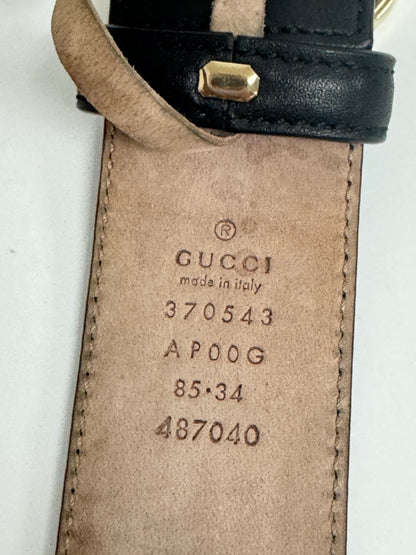 Lynn's Closet Boutique Gucci belt interior showing embossed logo, serial number, and size 85/34 on beige leather