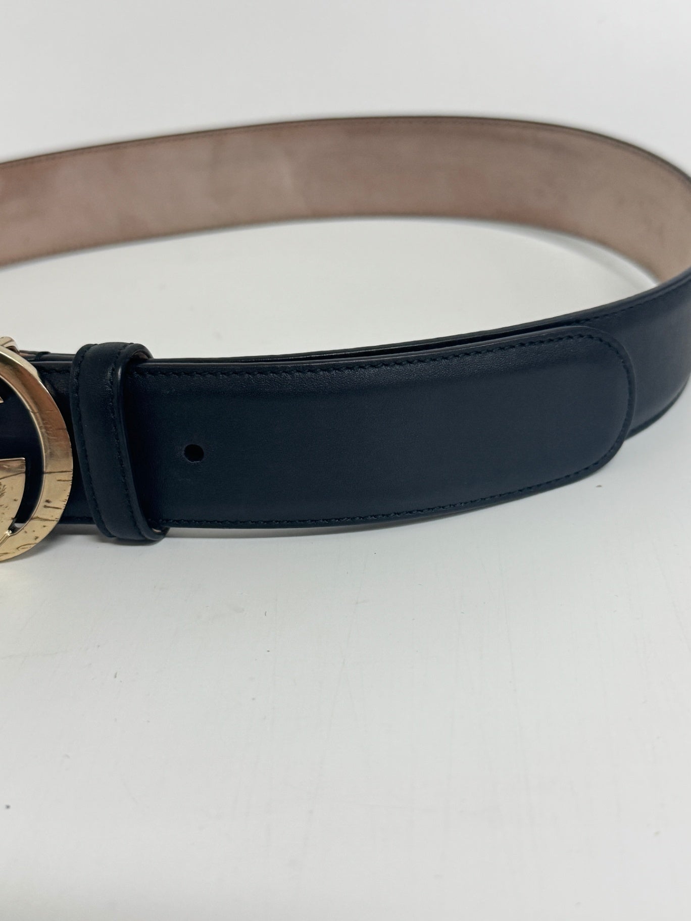 Lynn's Closet Boutique Gucci black calfskin leather belt with gold interlocking G buckle and distressed finish