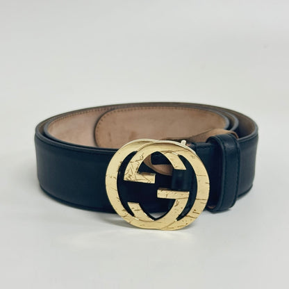 Lynn's Closet Boutique pre-owned Gucci black calfskin leather belt with a distressed gold Interlocking G buckle.