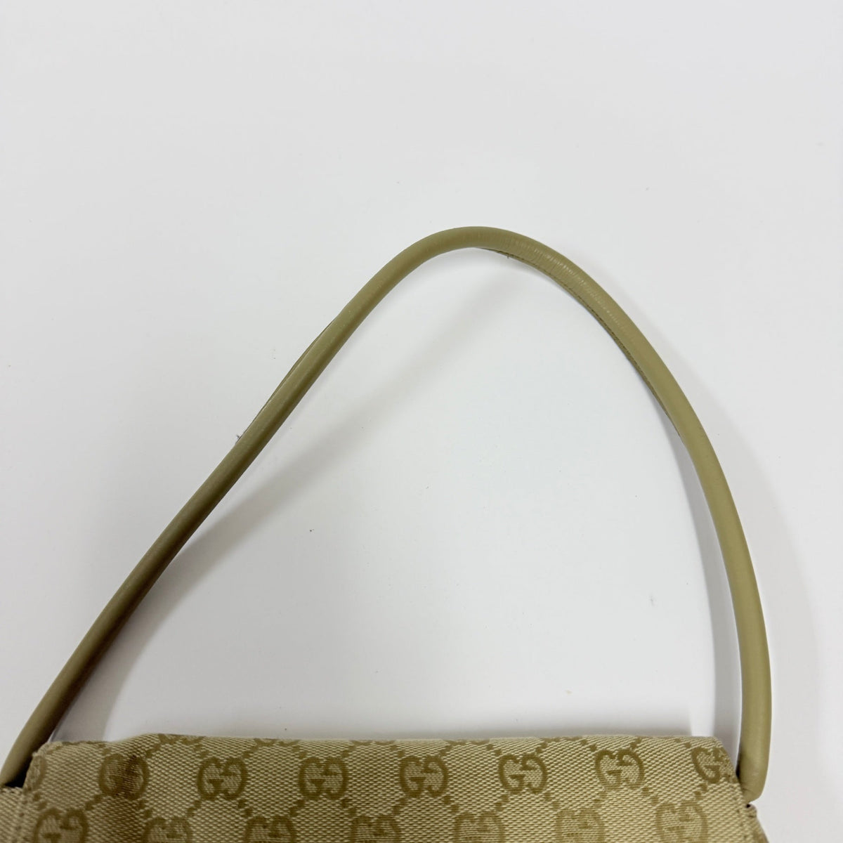 Lynn's Closet Boutique vintage Gucci GG monogram canvas shoulder bag strap detail in beige leather
