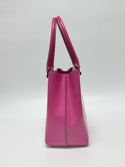 Lynn's Closet Boutique hot pink leather Kate Spade New York tote bag, side profile view showing structured design.
