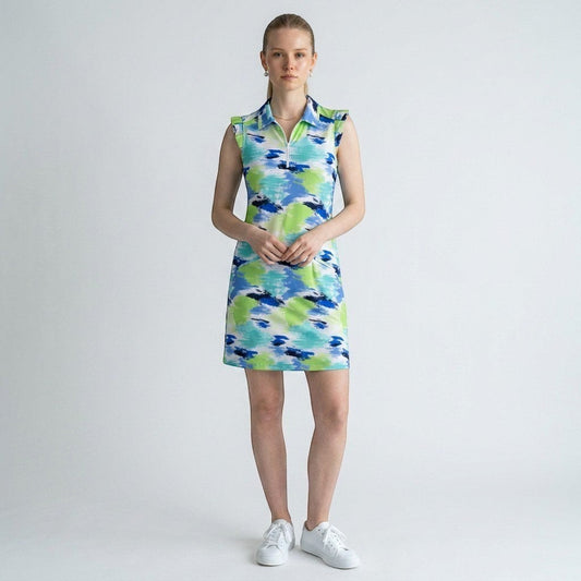Model wearing a Lynn's Closet Boutique Ibkul sleeveless polo dress with a green and blue abstract brushstroke print.