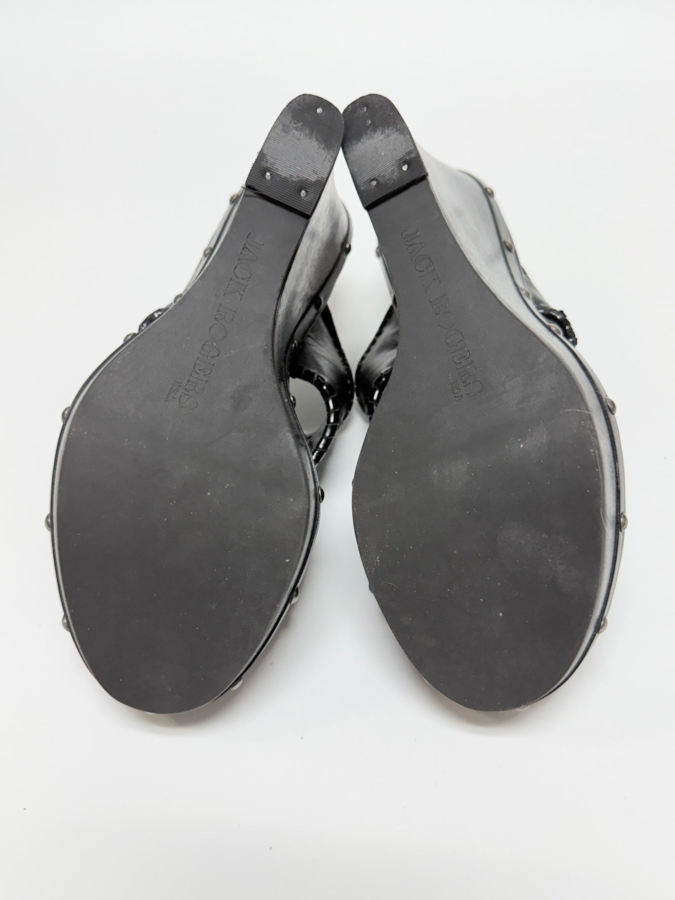 Lynn's Closet Boutique Jack Rogers black leather wedge sandals with signature whipstitch detail and stud accents.