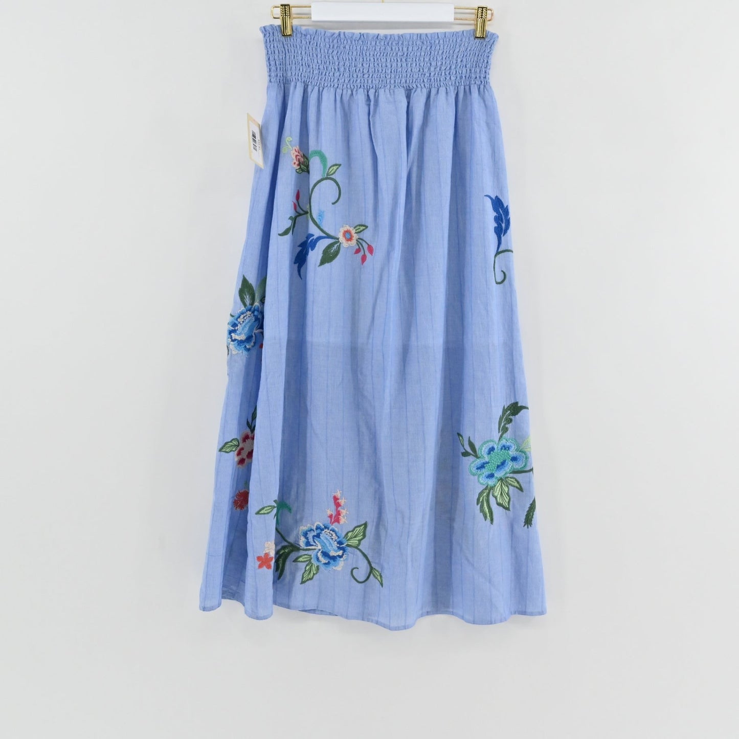 Lynn's Closet Boutique Johnny Was sky-blue maxi skirt with vibrant floral embroidery and a smocked waistband.