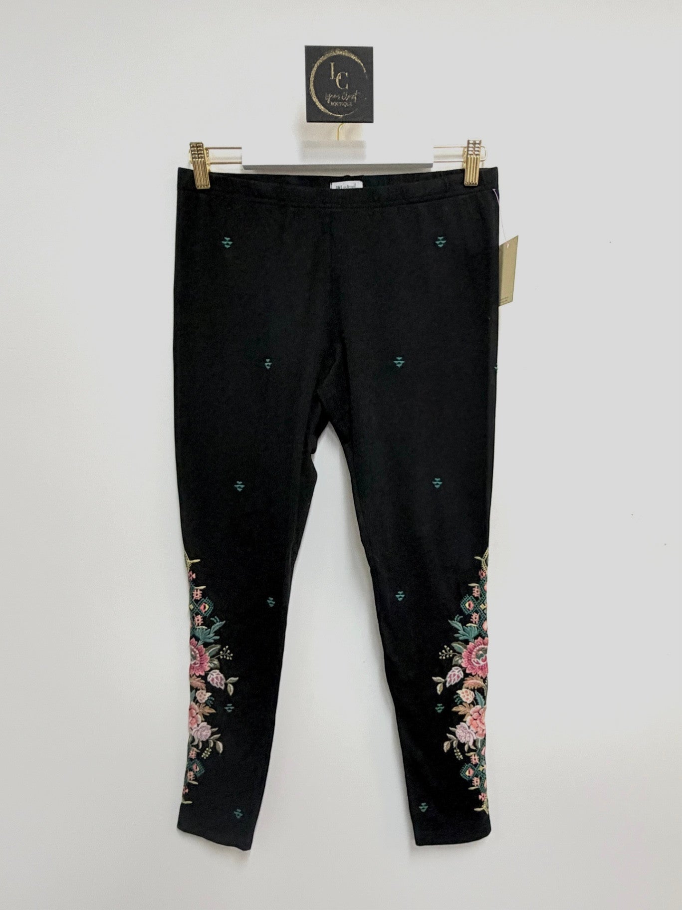 Lynn's Closet Boutique Johnny Was black leggings with colorful floral embroidery and geometric accents, size M.