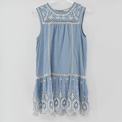 Lynn's Closet Boutique dusty blue Joie mini dress with white floral embroidery, eyelet lace hem, and ladder-stitch trim.