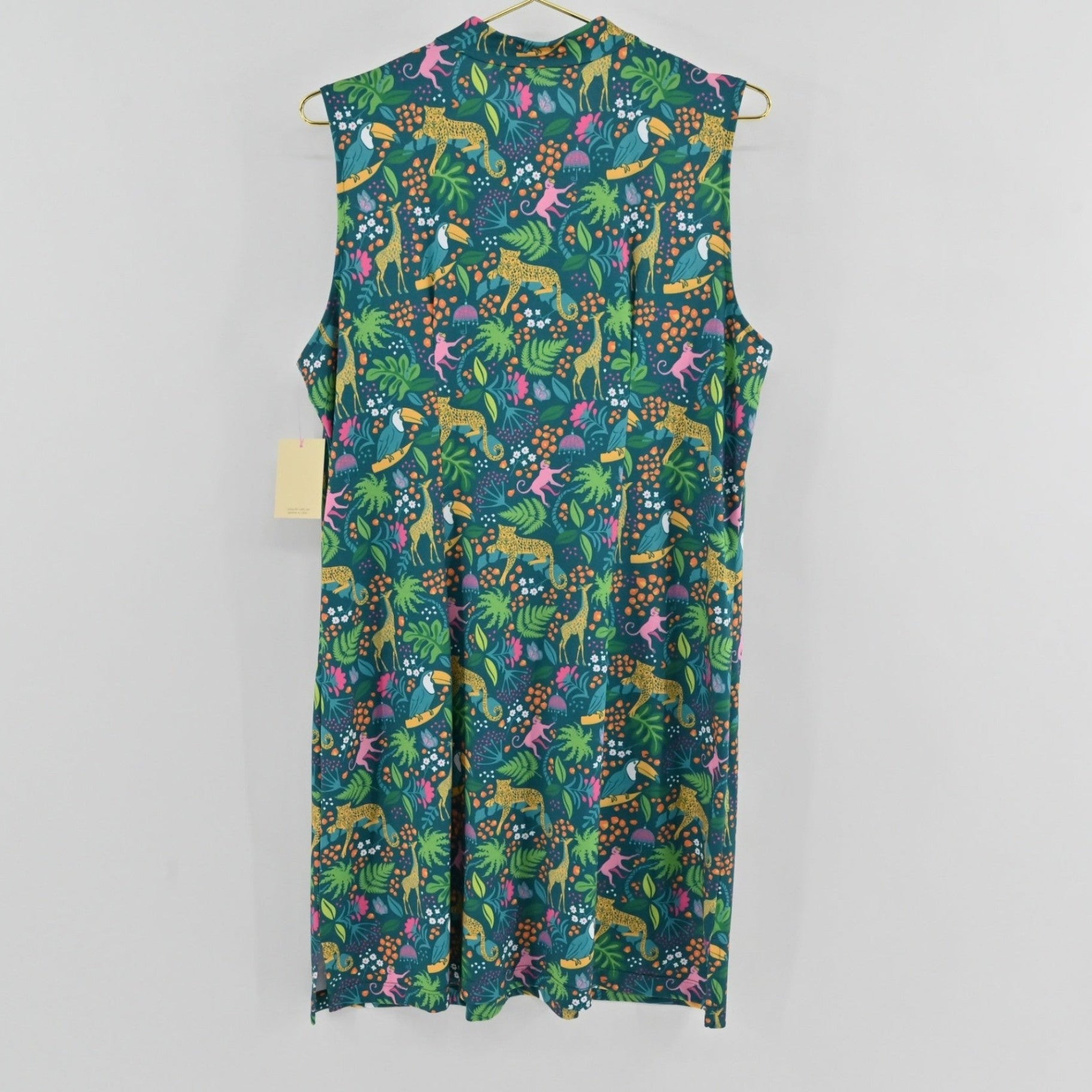Lynn's Closet Boutique Katherine Way sleeveless dress with green jungle animal print, high neck, and side pockets.