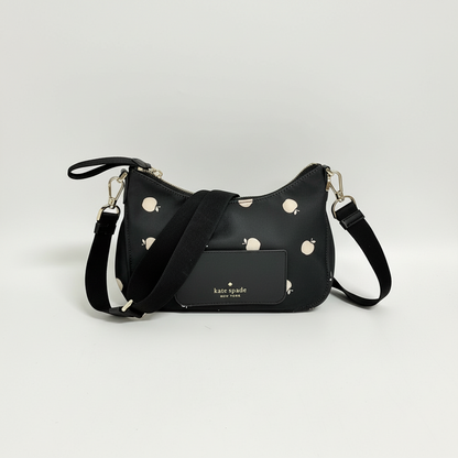 Lynn's Closet Boutique Kate Spade Chelsea nylon crossbody bag in black with a playful white apple print and logo.