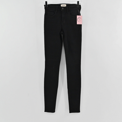 Lynn's Closet Boutique L'Agence Marguerite black skinny jeans with mid-rise fit and button-zip closure.