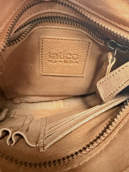 Interior of Lynn's Closet Boutique Latico Leathers brown leather bag showing brand logo patch and card slots