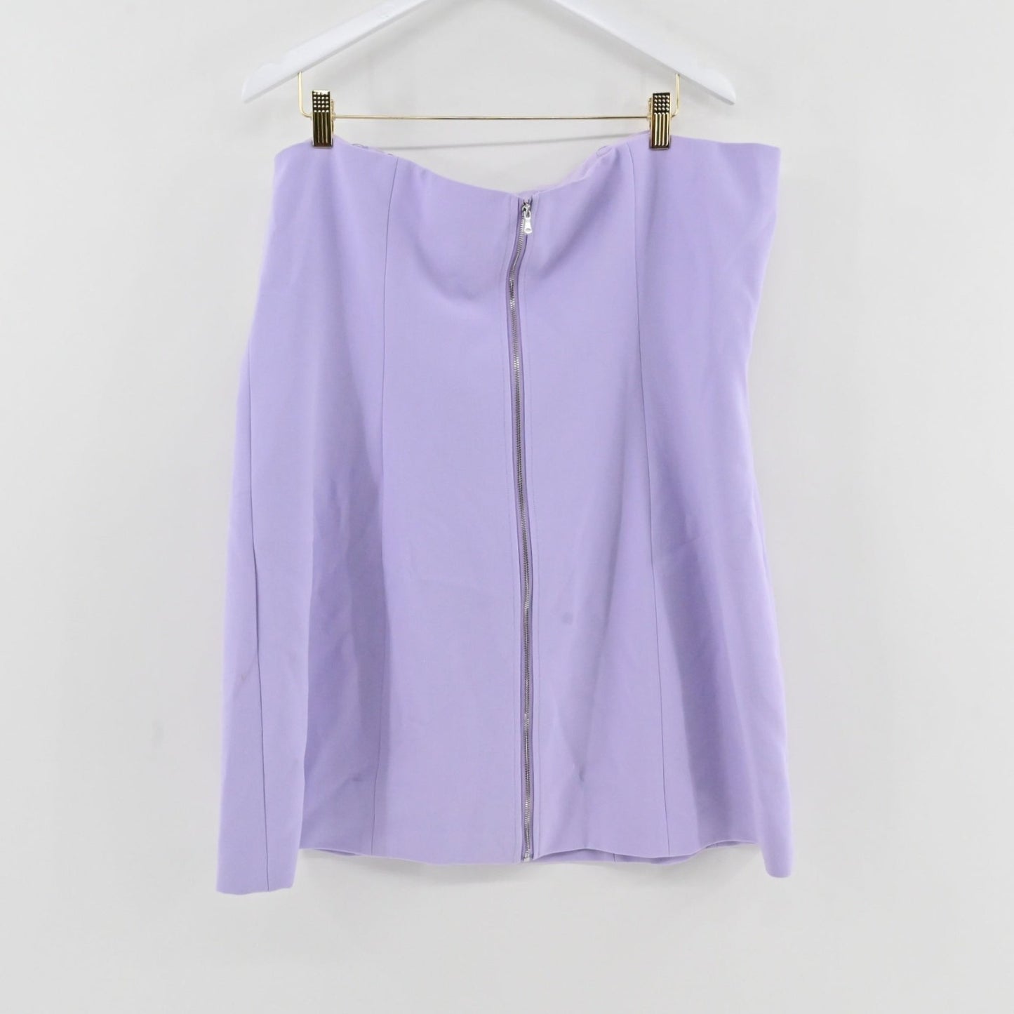 Lynn's Closet Boutique L'Agence lilac strapless bustier dress with a front zipper hanging on a white hanger.