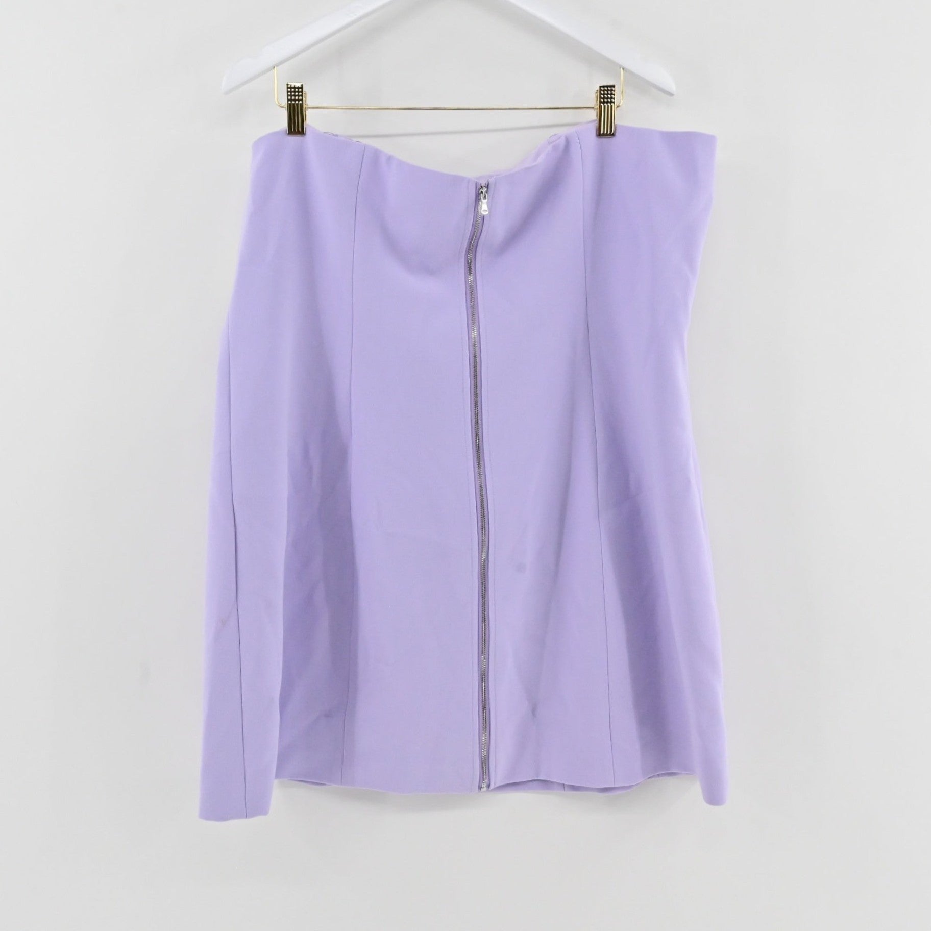 Lynn's Closet Boutique L'Agence lilac strapless bustier dress with a front zipper hanging on a white hanger.