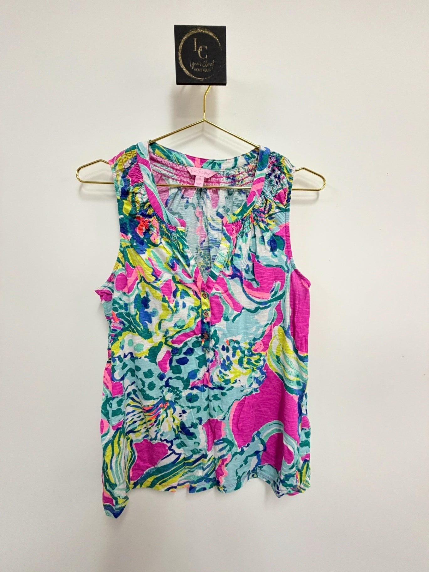 Lynn's Closet Boutique Lilly Pulitzer Essie sleeveless tank with vibrant tropical print, split neckline, and buttons.