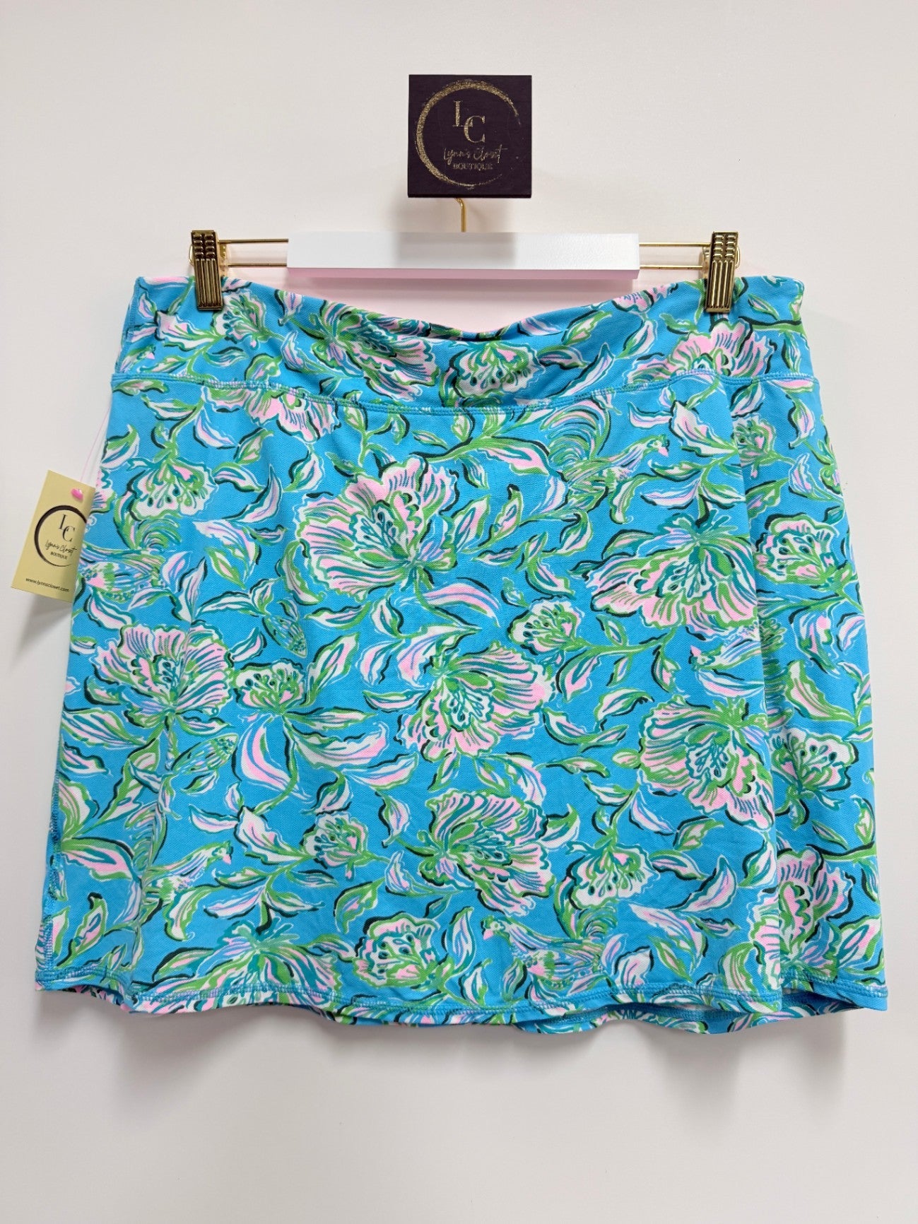 Lynn's Closet Boutique Lilly Pulitzer Luxletic skort in a turquoise floral print with pink and green accents.