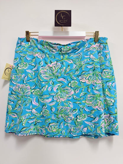 Lynn's Closet Boutique Lilly Pulitzer Luxletic skort in a turquoise floral print with pink and green accents.