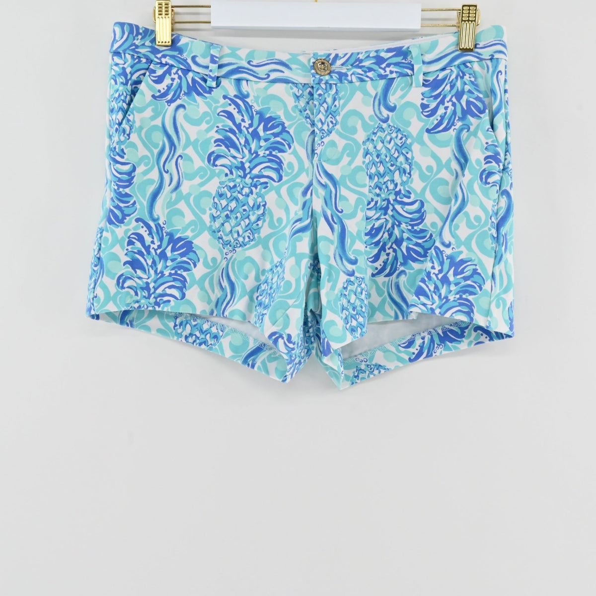 Lynn's Closet Boutique Lilly Pulitzer Callahan shorts in blue and white pineapple print with a tailored mid-rise fit.