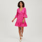 Model wearing a hot pink Lilly Pulitzer Felicity lace dress with bell sleeves from Lynn's Closet Boutique.