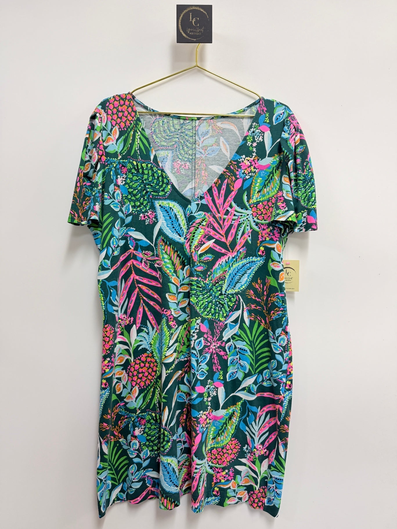 Lynn's Closet Boutique Lilly Pulitzer Aleece V-neck T-shirt dress with a vibrant tropical botanical print.
