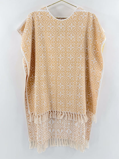 Lynn's Closet Boutique Louis Vuitton yellow and white monogram flower tile beach cape with a fringed hem.