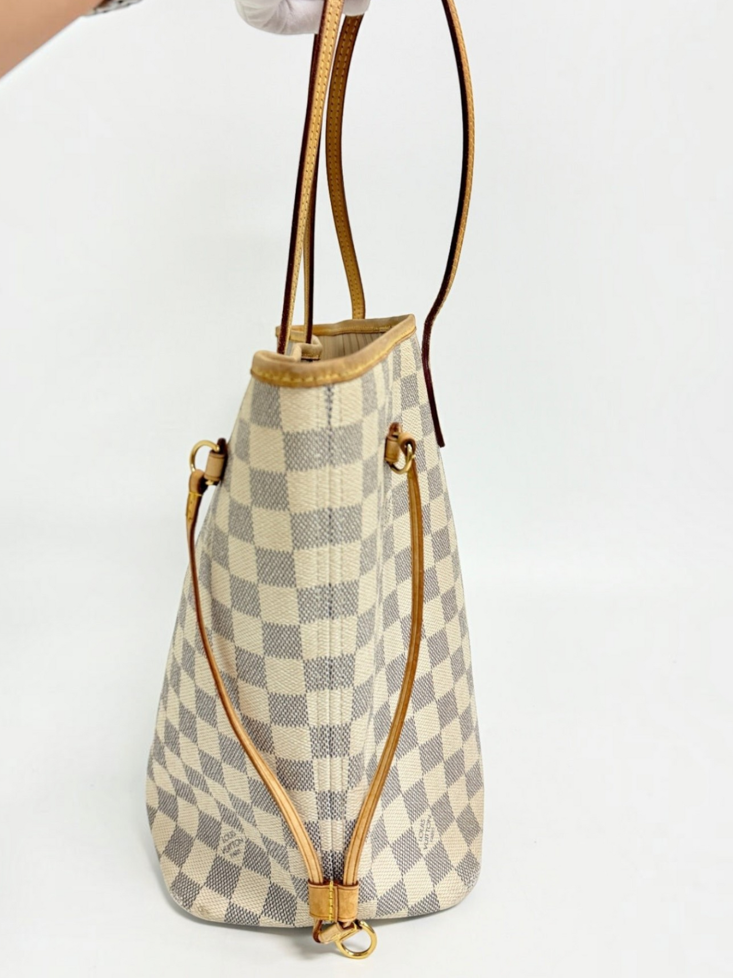 Lynn's Closet Boutique Louis Vuitton Neverfull MM tote in Damier Azur canvas with vachetta leather trim, side view.
