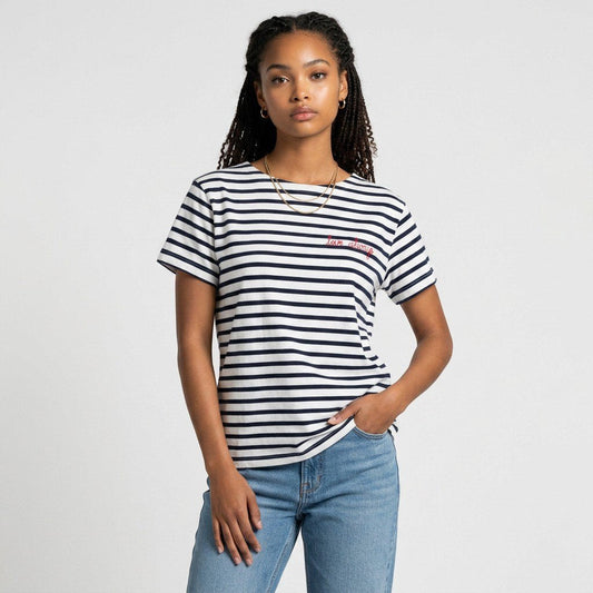 Model wearing a Lynn's Closet Boutique Maison Labiche Paris navy and white striped cotton t-shirt with red embroidery.