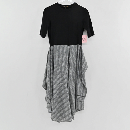 Lynn's Closet Boutique Maje midi dress with a black short-sleeve bodice and an asymmetrical grey checkered skirt.