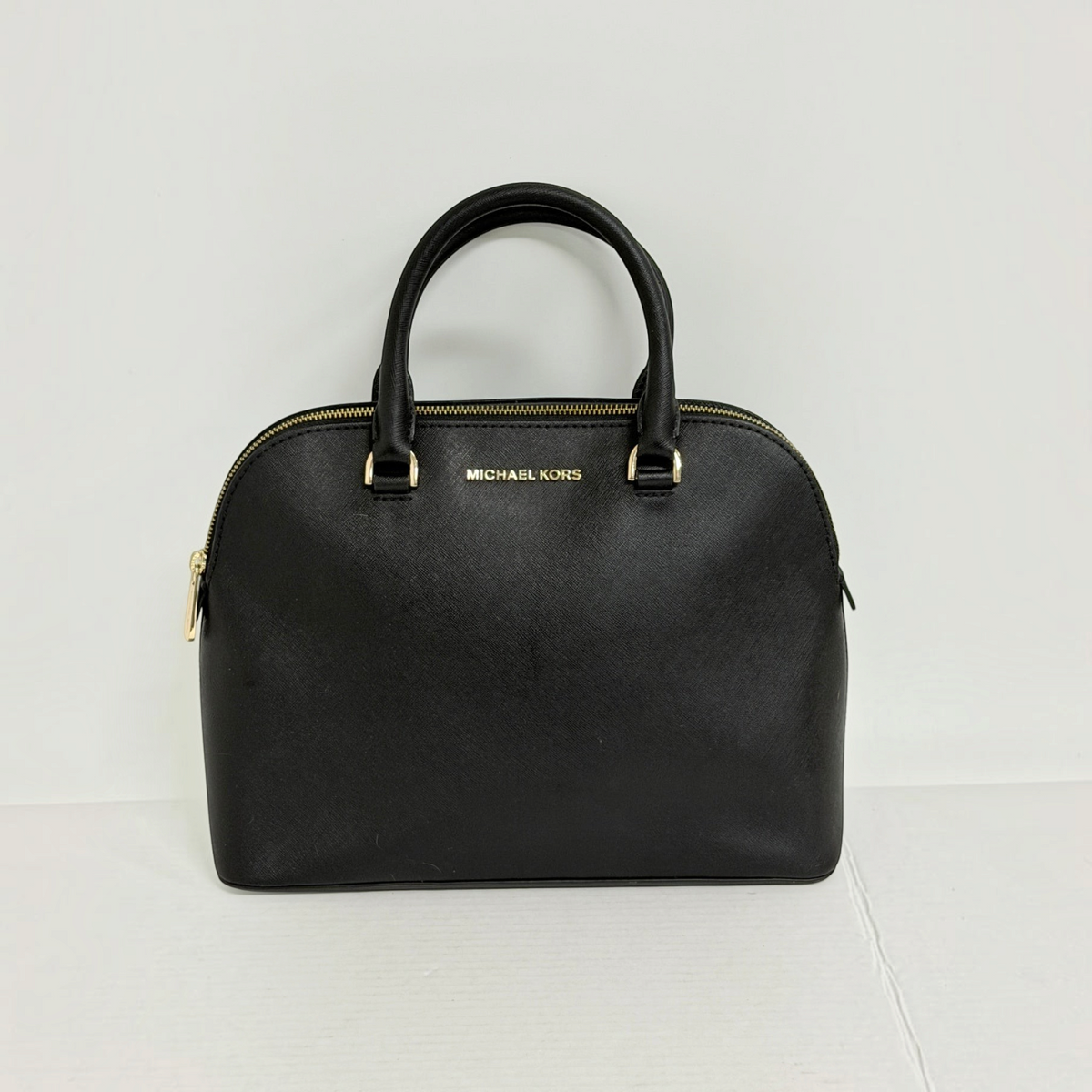 Lynn's Closet Boutique Michael Kors black Saffiano leather dome tote with gold-tone hardware and top-zip closure