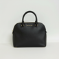 Lynn's Closet Boutique Michael Kors black Saffiano leather dome tote with gold-tone hardware and top-zip closure.