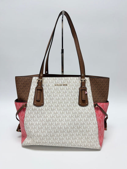 Lynn's Closet Boutique Michael Kors color-block logo tote in brown, white, and pink canvas with leather straps.