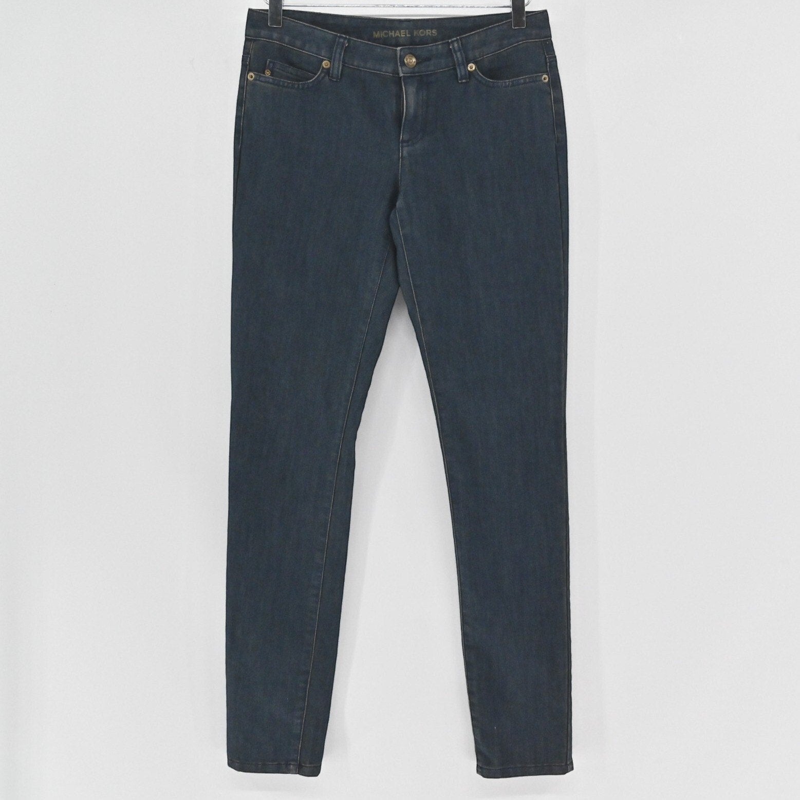 Lynn's Closet Boutique Michael Kors dark wash denim jeans with classic five-pocket styling on a hanger.