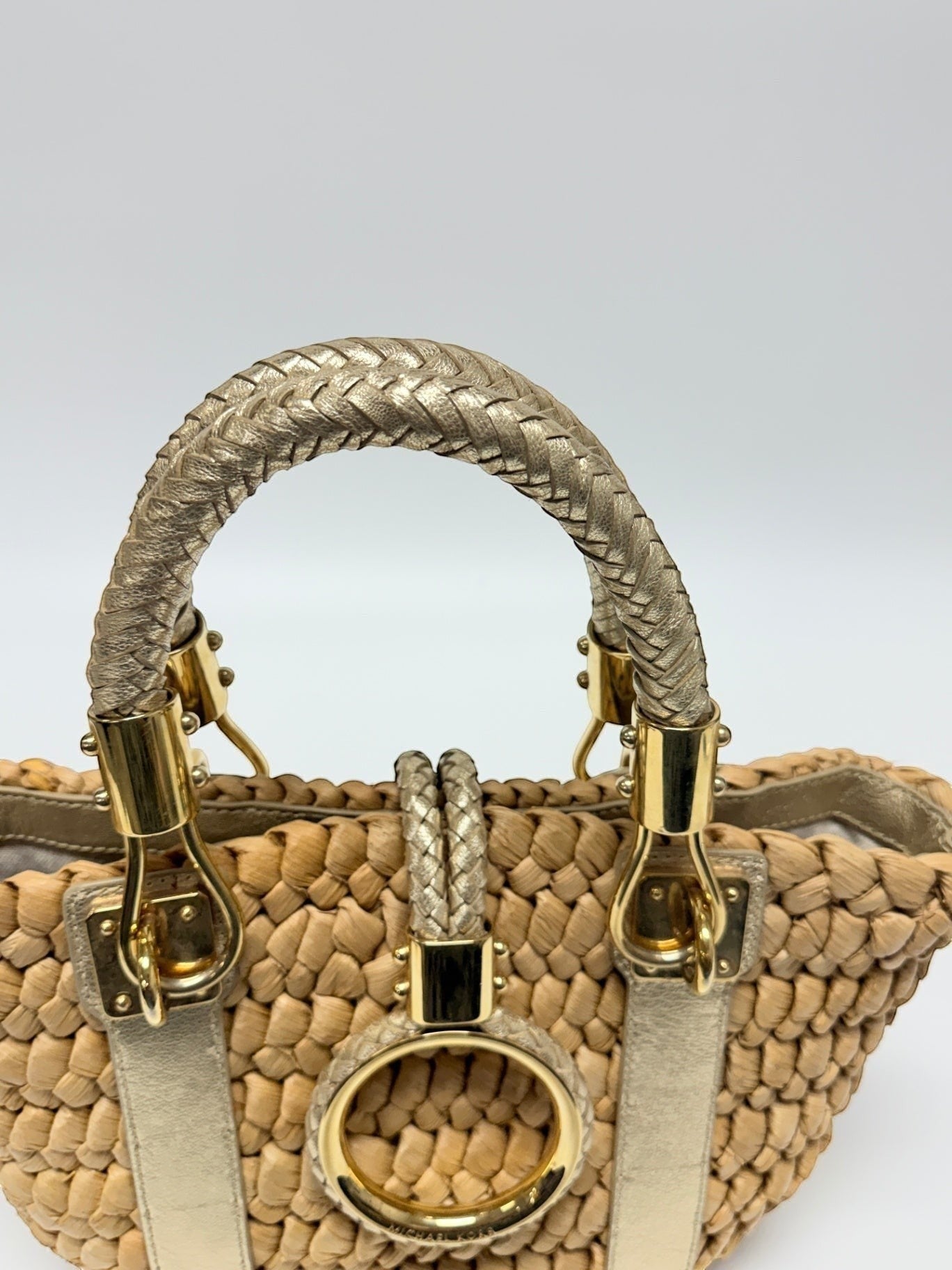 Lynn's Closet Boutique Michael Kors raffia tote with braided metallic gold leather handles and gold-tone ring hardware.