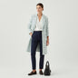 Lynn's Closet Boutique mint green striped textured jacket with a white V-neck top and navy trousers. Size 38.