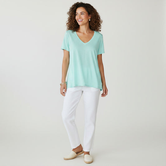 Lynn's Closet Boutique mint green v-neck t-shirt, size L, with a relaxed fit and high-low hem. Made of soft, breathable fabric.