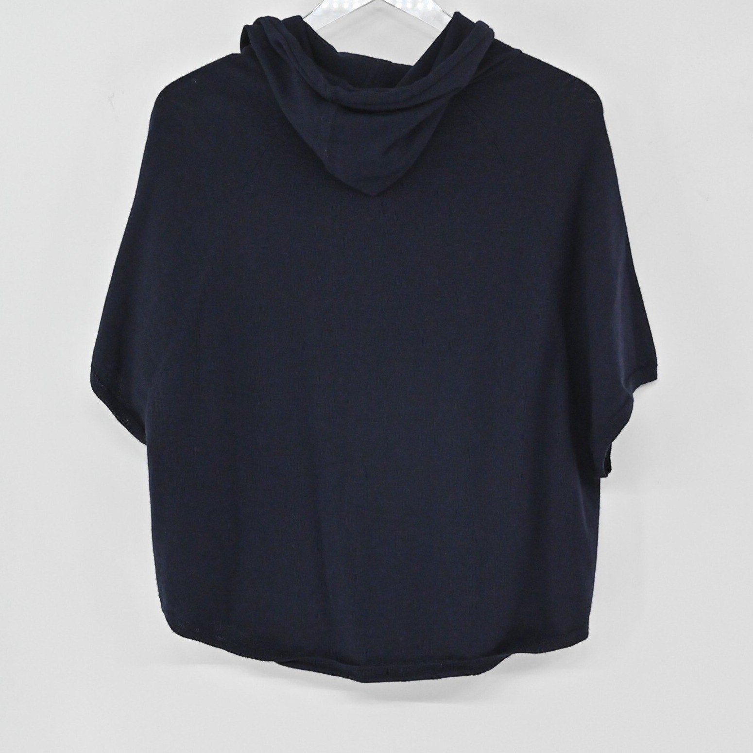 Lynn's Closet Boutique navy Joie short-sleeve merino wool hoodie with a relaxed boxy fit and hood, back view.