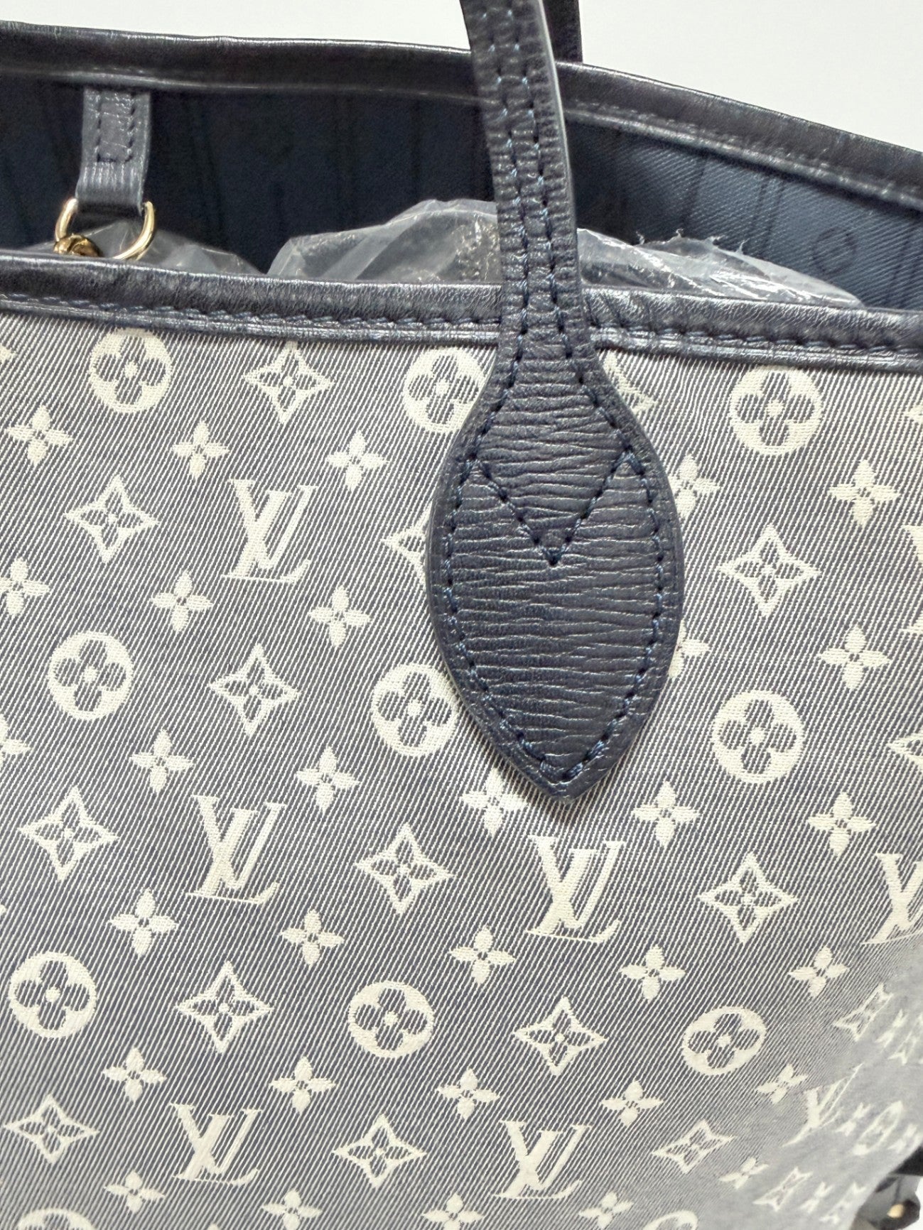 Lynn's Closet Boutique Louis Vuitton Neverfull MM tote in navy blue Monogram Idylle canvas with dark leather trim.