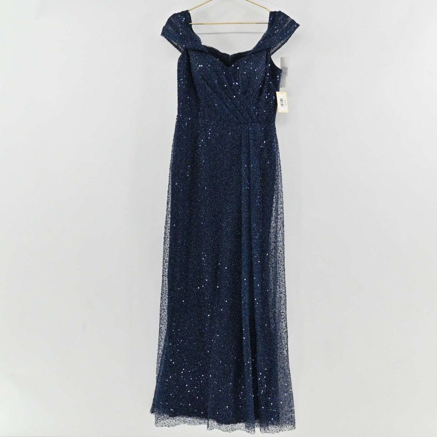 Lynn's Closet Boutique Rickie Freeman navy blue sequin floor-length formal gown with an off-the-shoulder neckline.
