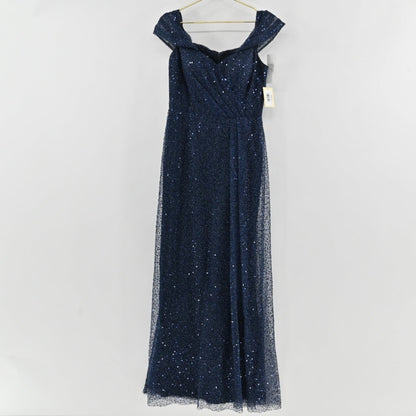 Lynn's Closet Boutique Rickie Freeman navy blue sequin floor-length formal gown with an off-the-shoulder neckline.
