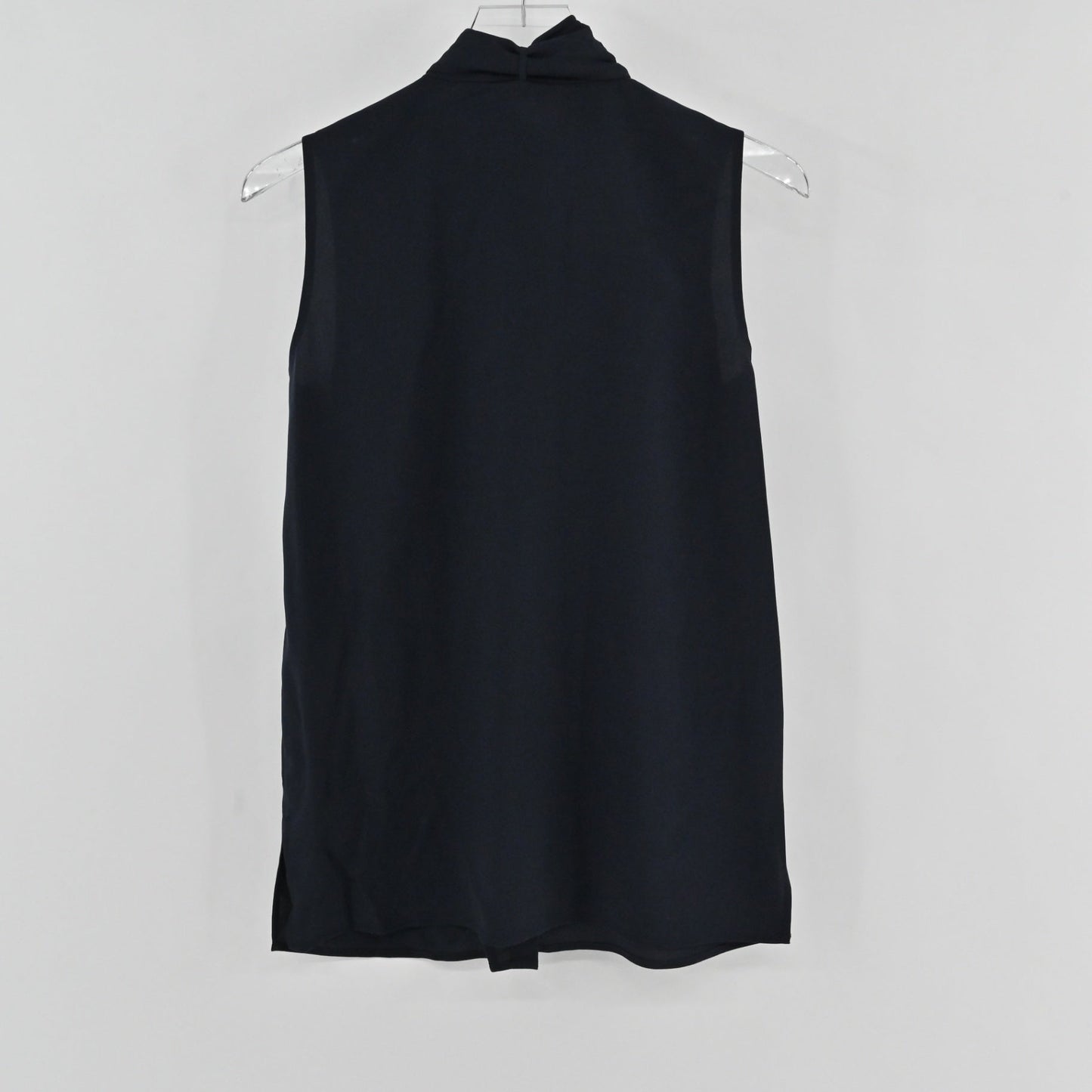 Lynn's Closet Boutique navy sleeveless Tory Burch top with a high tie-neck detail, shown from the back.