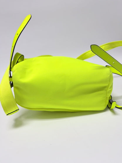 Lynn's Closet Boutique Kate Spade Chelsea neon yellow nylon backpack, bottom view showing adjustable straps.