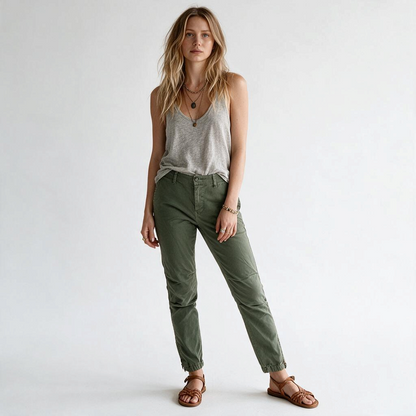 Model wearing Lynn's Closet Boutique Nili Lotan olive green slim-fit utility pants with side-zip ankles