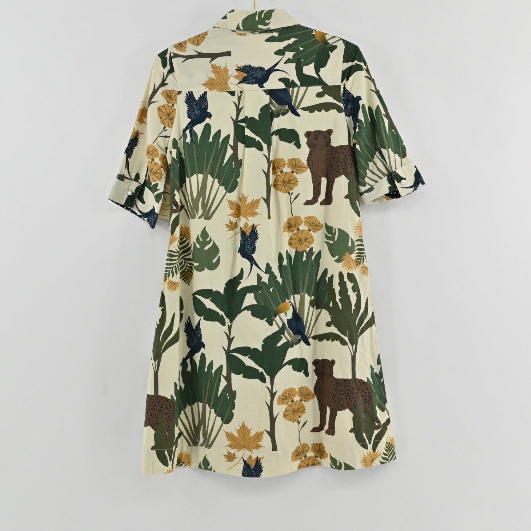 Lynn's Closet Boutique Just Darviny Oberoi shirt dress with a cream base and tropical animal and foliage print.