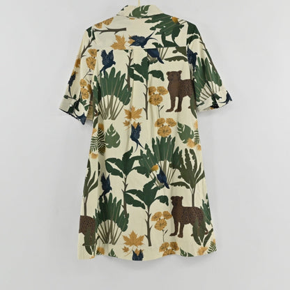 Lynn's Closet Boutique Just Darviny Oberoi shirt dress with a cream base and tropical animal and foliage print.