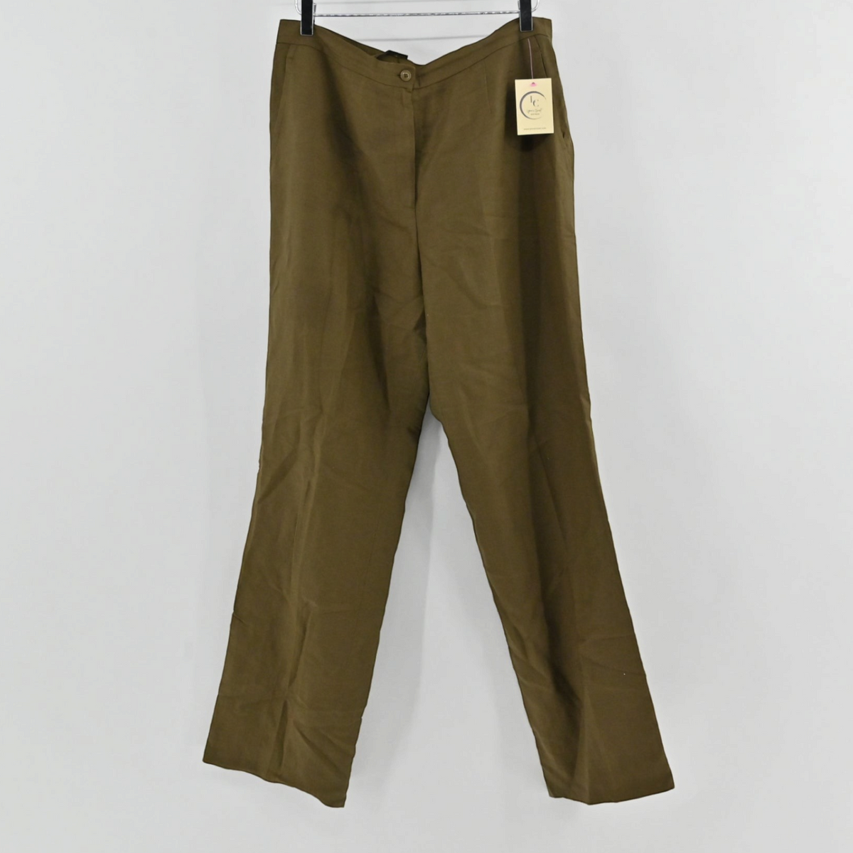 Lynn's Closet Boutique Kasper olive green tailored trousers with a button closure hanging on a hanger