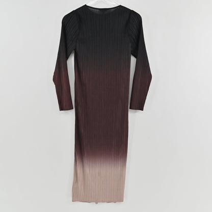 Lynn's Closet Boutique Misook ombré pleated knit midi dress featuring a black to beige gradient and long sleeves.