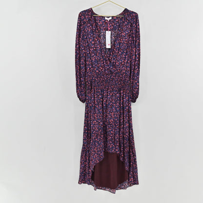 Lynn's Closet Boutique Parker midi dress in deep purple with a pink and blue abstract print, wrap bodice, and high-low hem