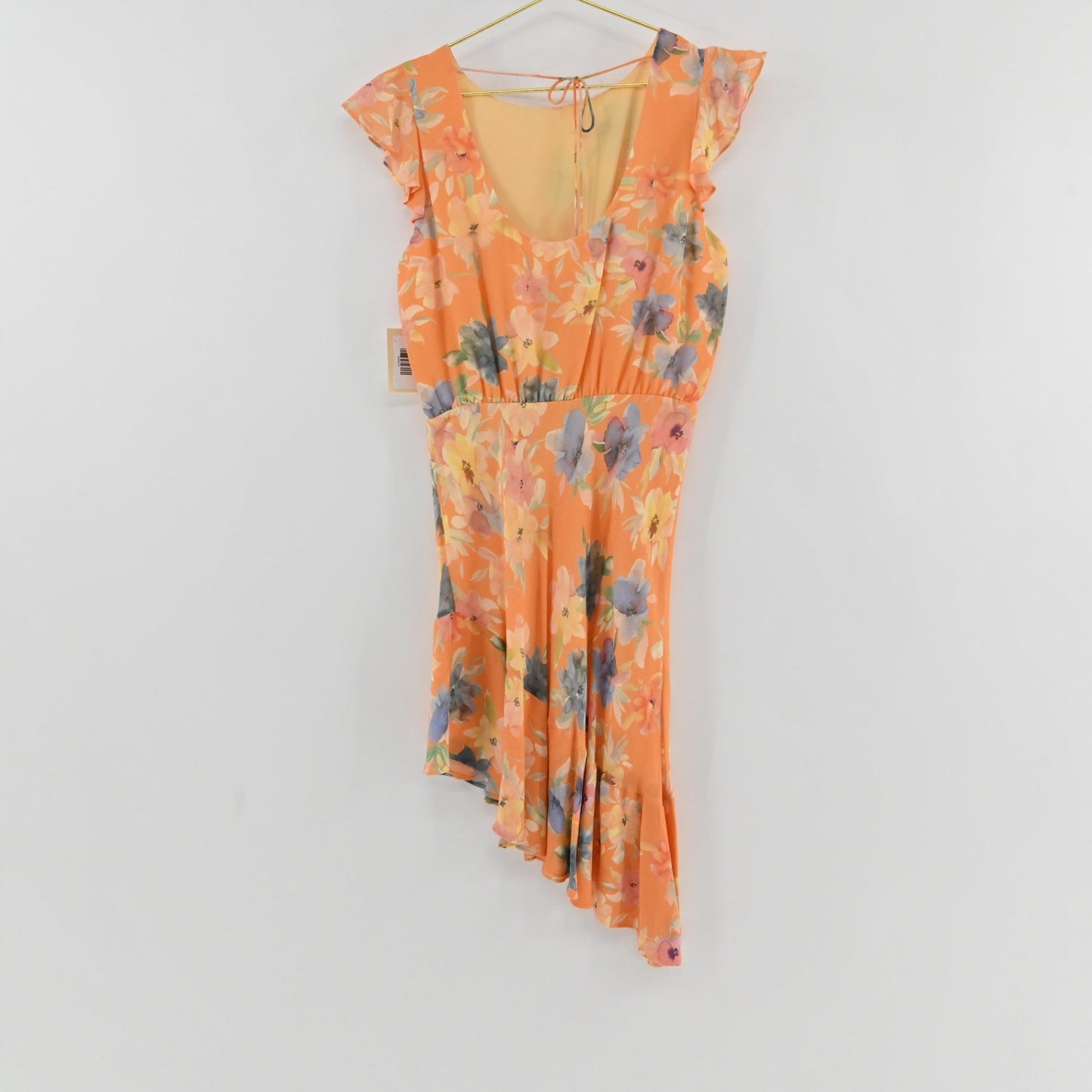 Lynn's Closet Boutique Amanda Uprichard peach floral midi dress with flutter sleeves and asymmetrical high-low hem
