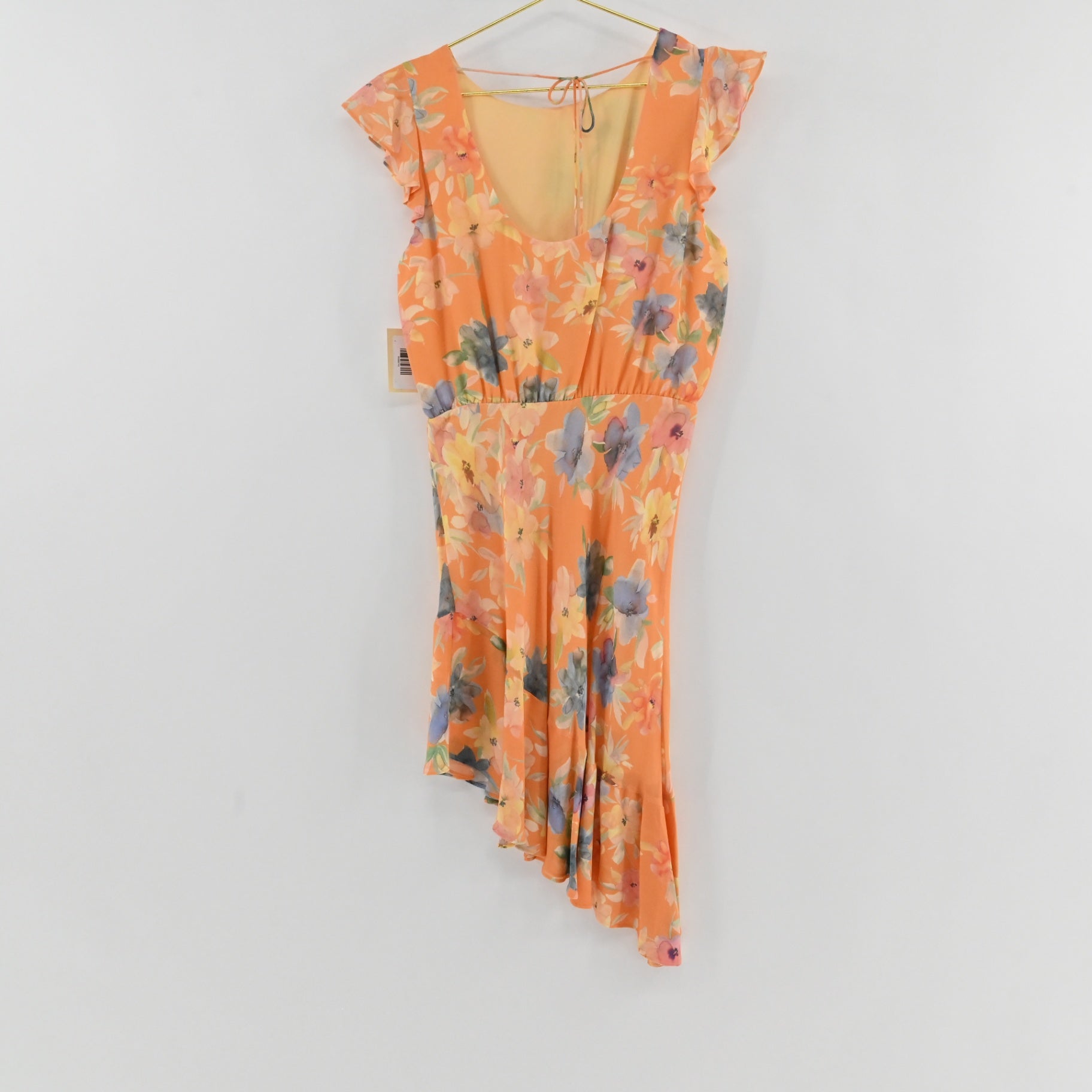 Lynn's Closet Boutique Amanda Uprichard peach floral midi dress with flutter sleeves and asymmetrical high-low hem