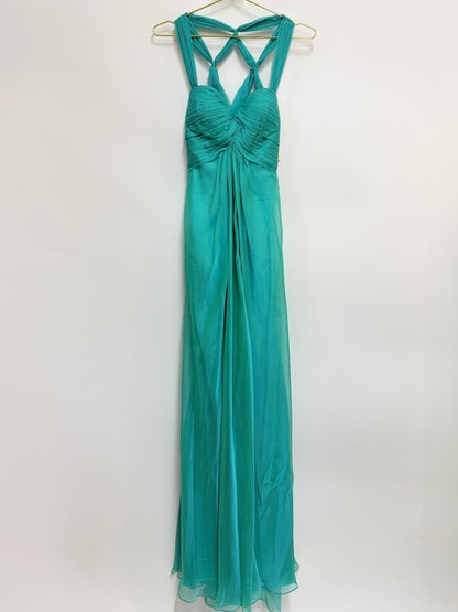 Lynn's Closet Boutique La Femme peacock green chiffon evening gown with a ruched bodice and crisscross back straps.