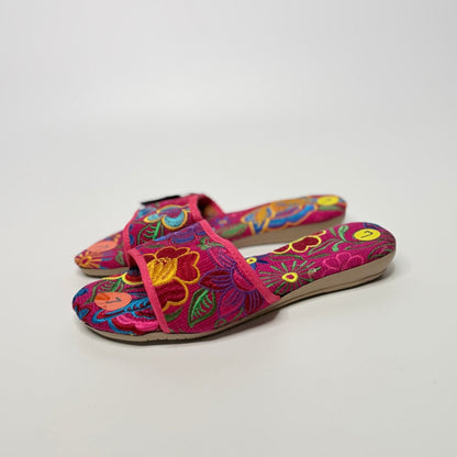 Lynn's Closet Boutique FreeDazz pink fabric slides with vibrant multi-colored floral embroidery and cushioned soles.