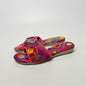 Lynn's Closet Boutique FreeDazz pink fabric slides with vibrant multi-colored floral embroidery and cushioned soles.
